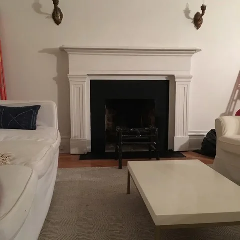 after flat black paint on the surround and hearth.jpeg
