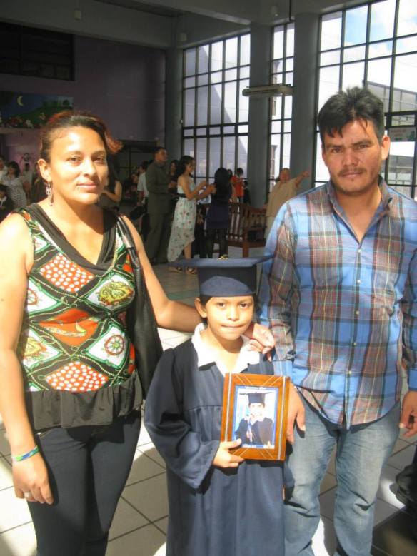 Richard with his wife Suyapa and son Axel at Axel’s graduation. He was so happy and proud – despite his lack of desire to smile for the camera.