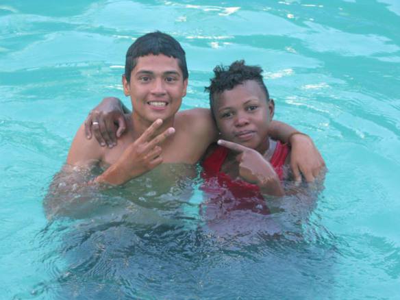 Yovanny (left) with Escarleth at the water park