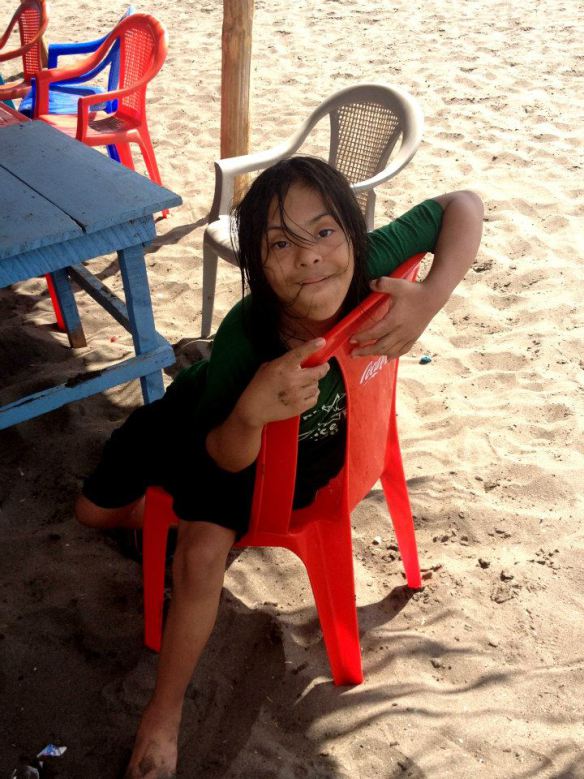 Brayan enjoying last year’s beach Christmas