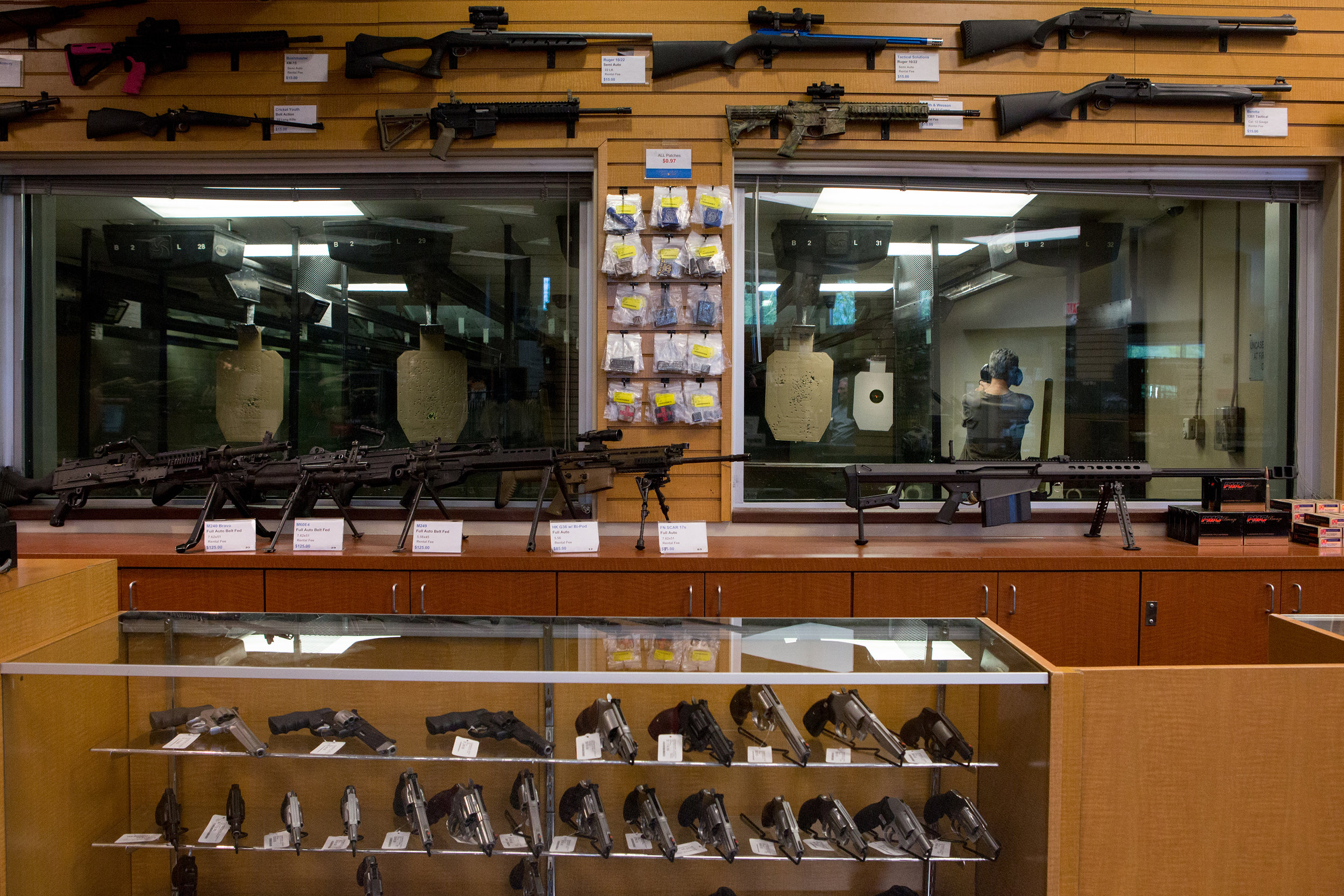  A man shoots targets at the Scottsdale Gun Club on April 18, 2016, in Scottsdale, Arizona. In the front of the store, the 14-year-old gun club sells guns and gear, and in the back, there are 32 indoor 25-yard shooting lanes. The club also holds cour