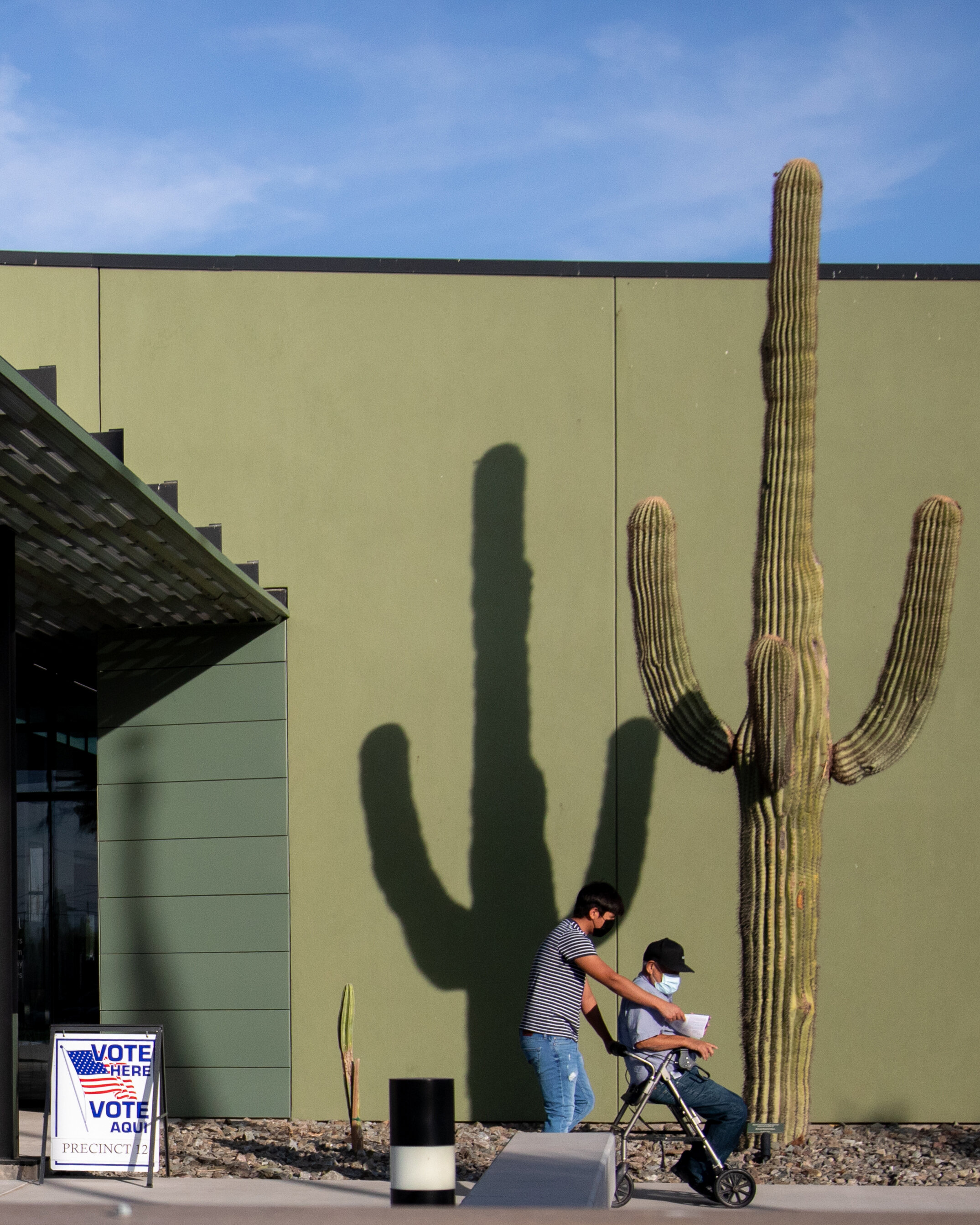  People exit the Eloy City Hall polling location on November 3, 2020 in Eloy, Arizona. After a record-breaking early voting turnout, Americans head to the polls on the last day to cast their vote for incumbent U.S. President Donald Trump or Democrati
