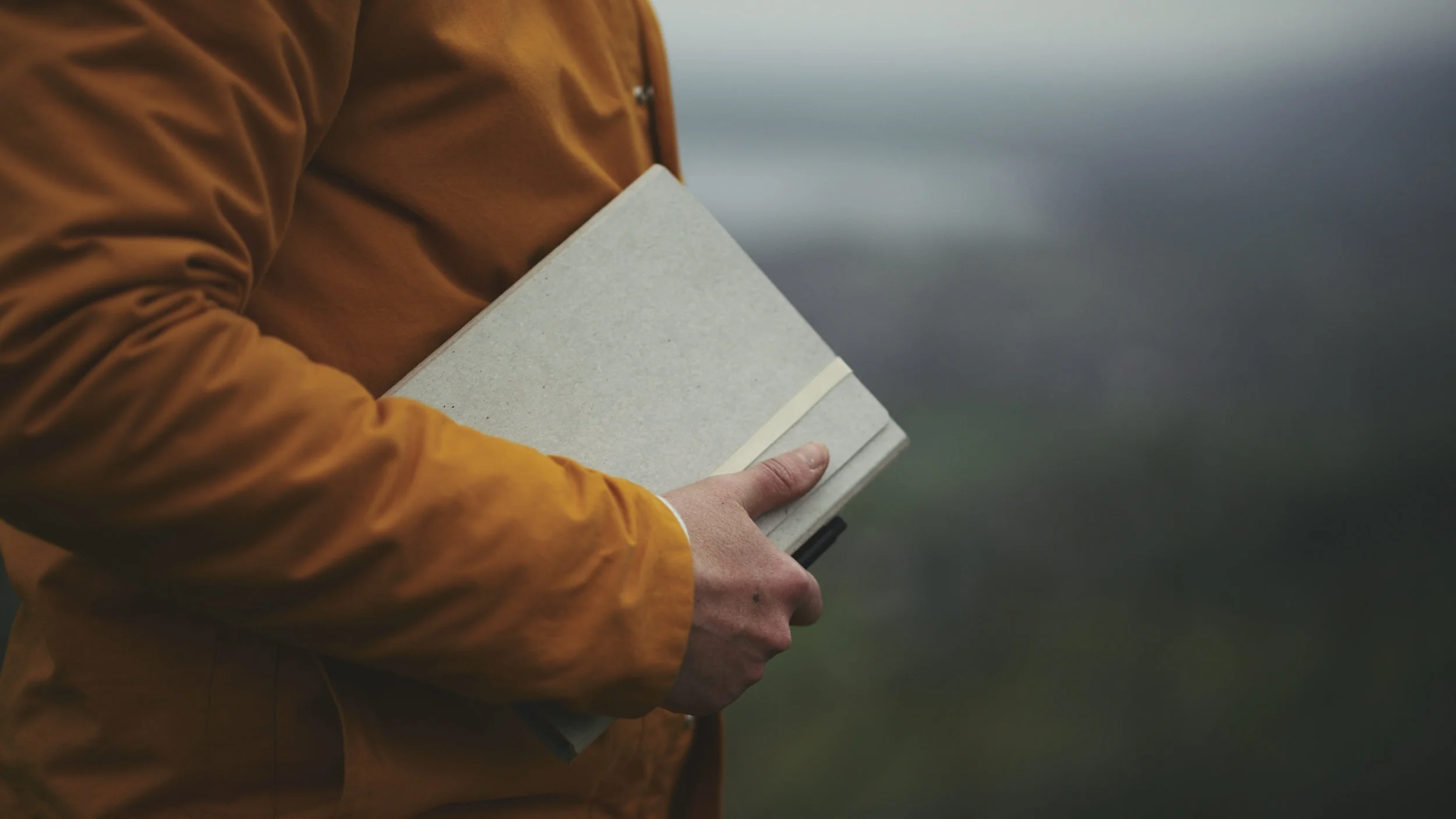 Man Holding Book.jpg