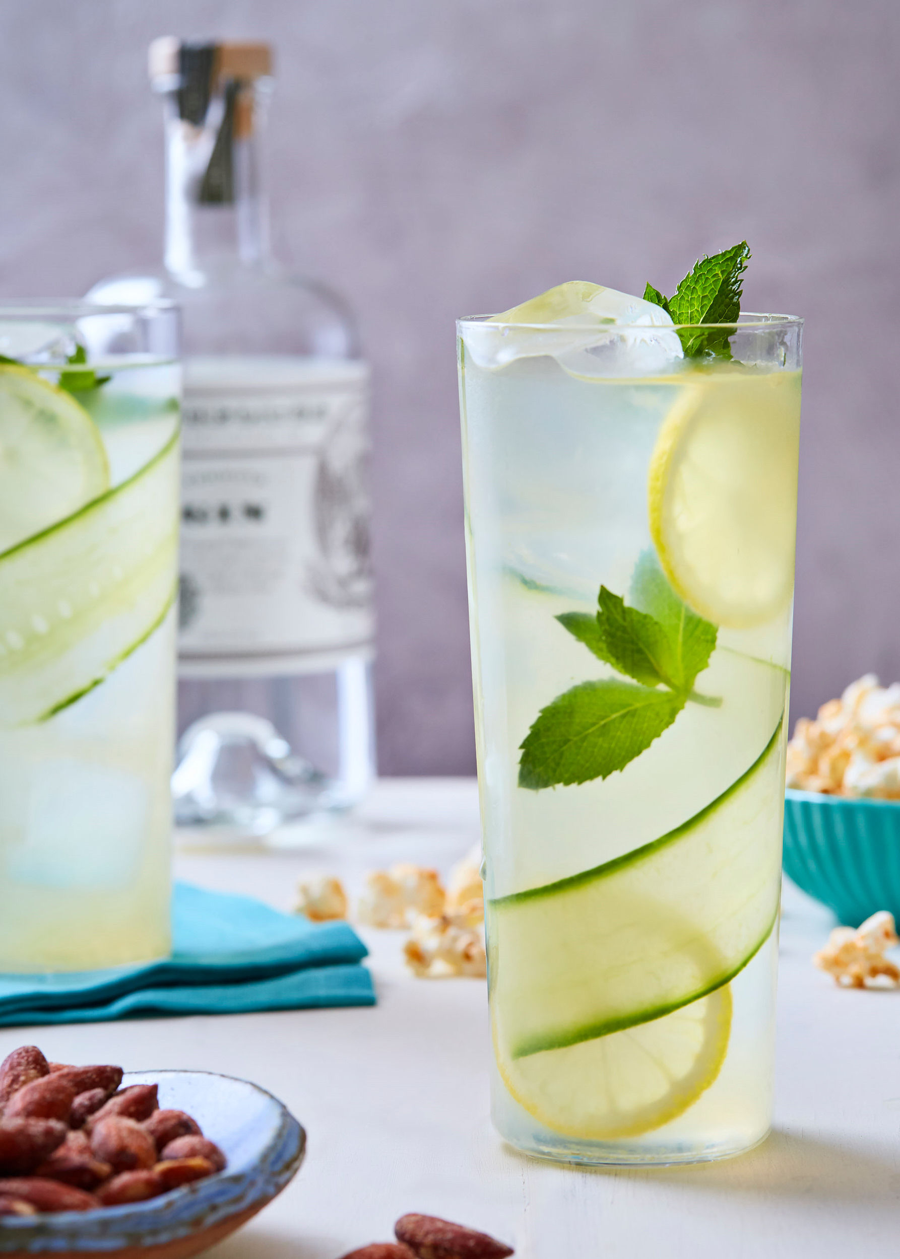 Cucumber mint gin gimlet cocktail and bar snacks.