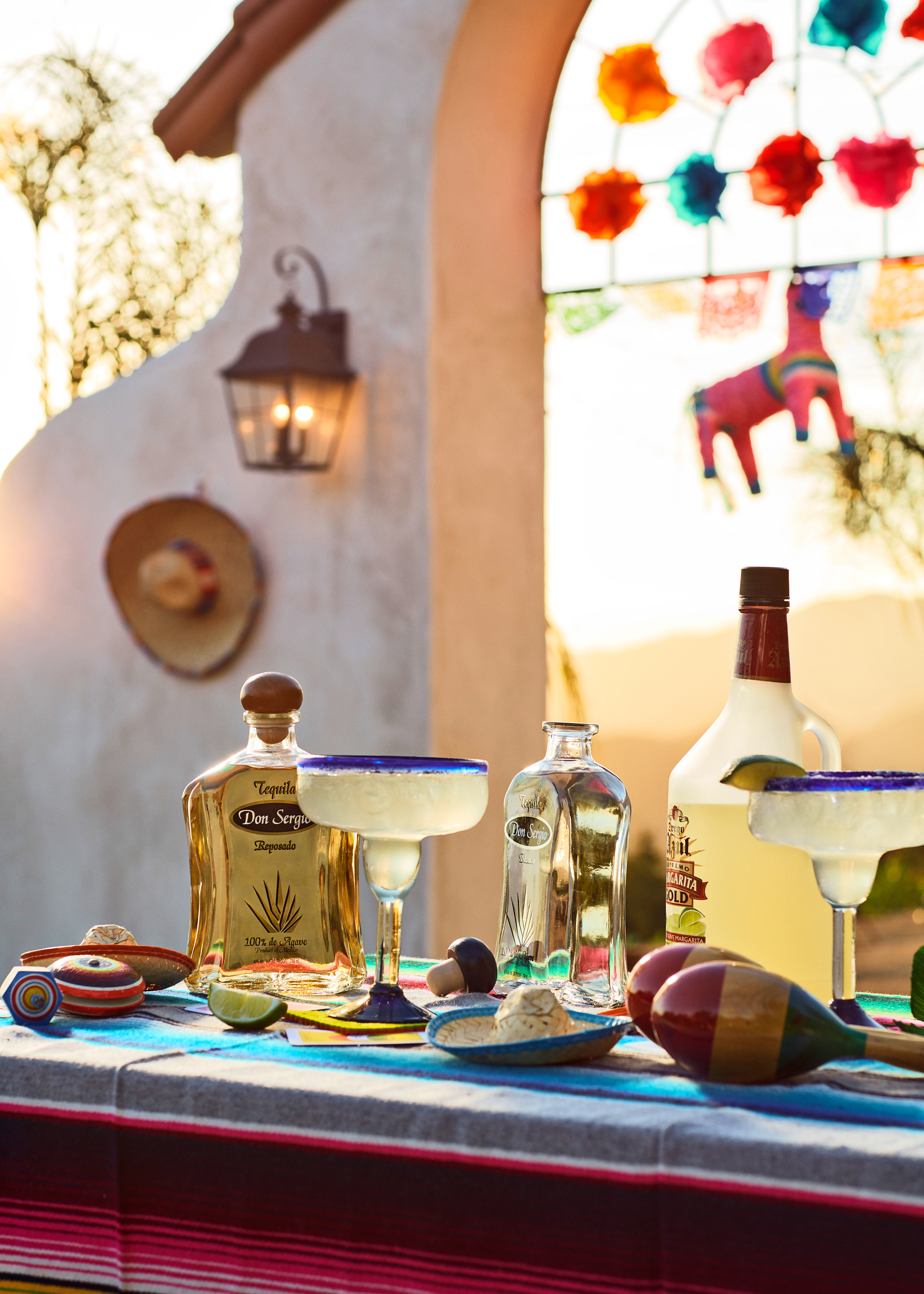 Margarita bar at an outdoor party. Celebrating at a Spanish style home.