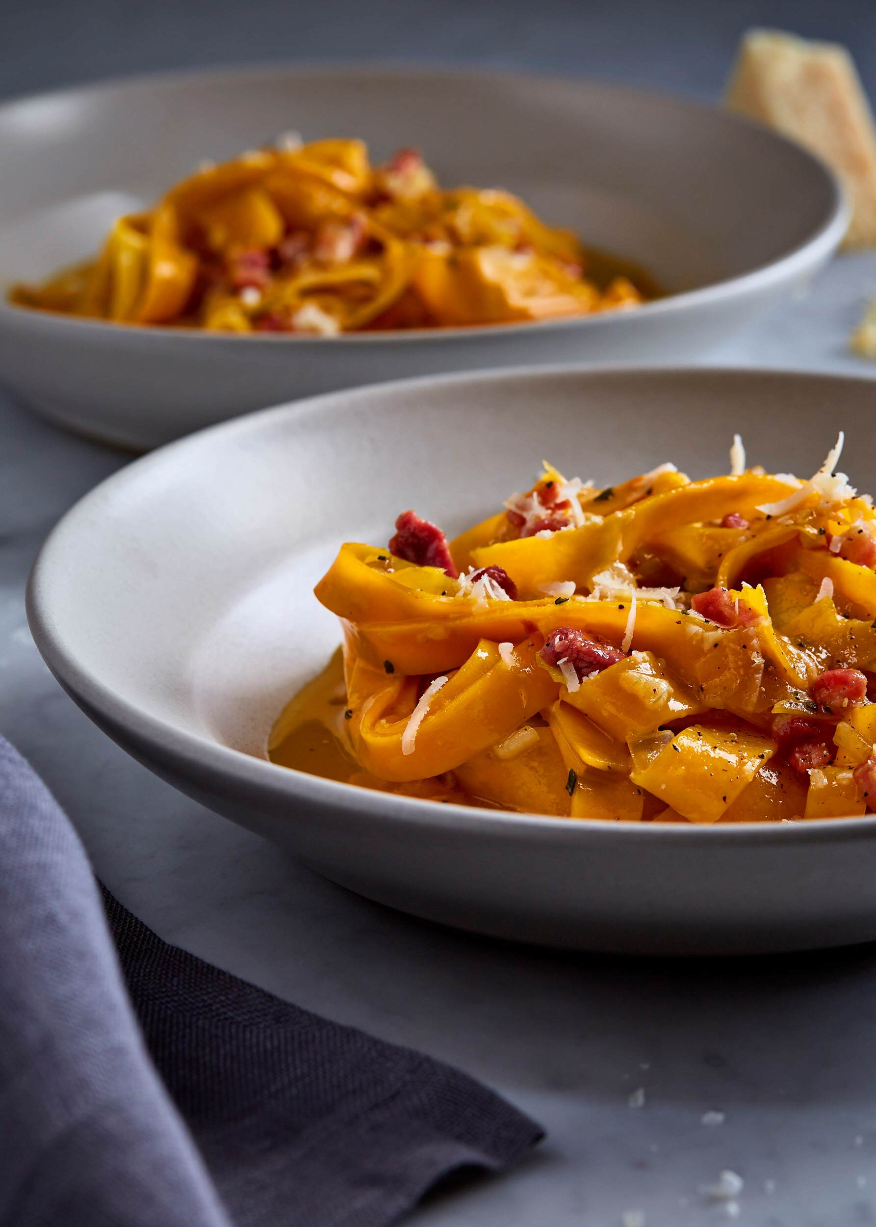 Pasta made from ribbons of spiralized butternut squash with pancetta and parmesan.