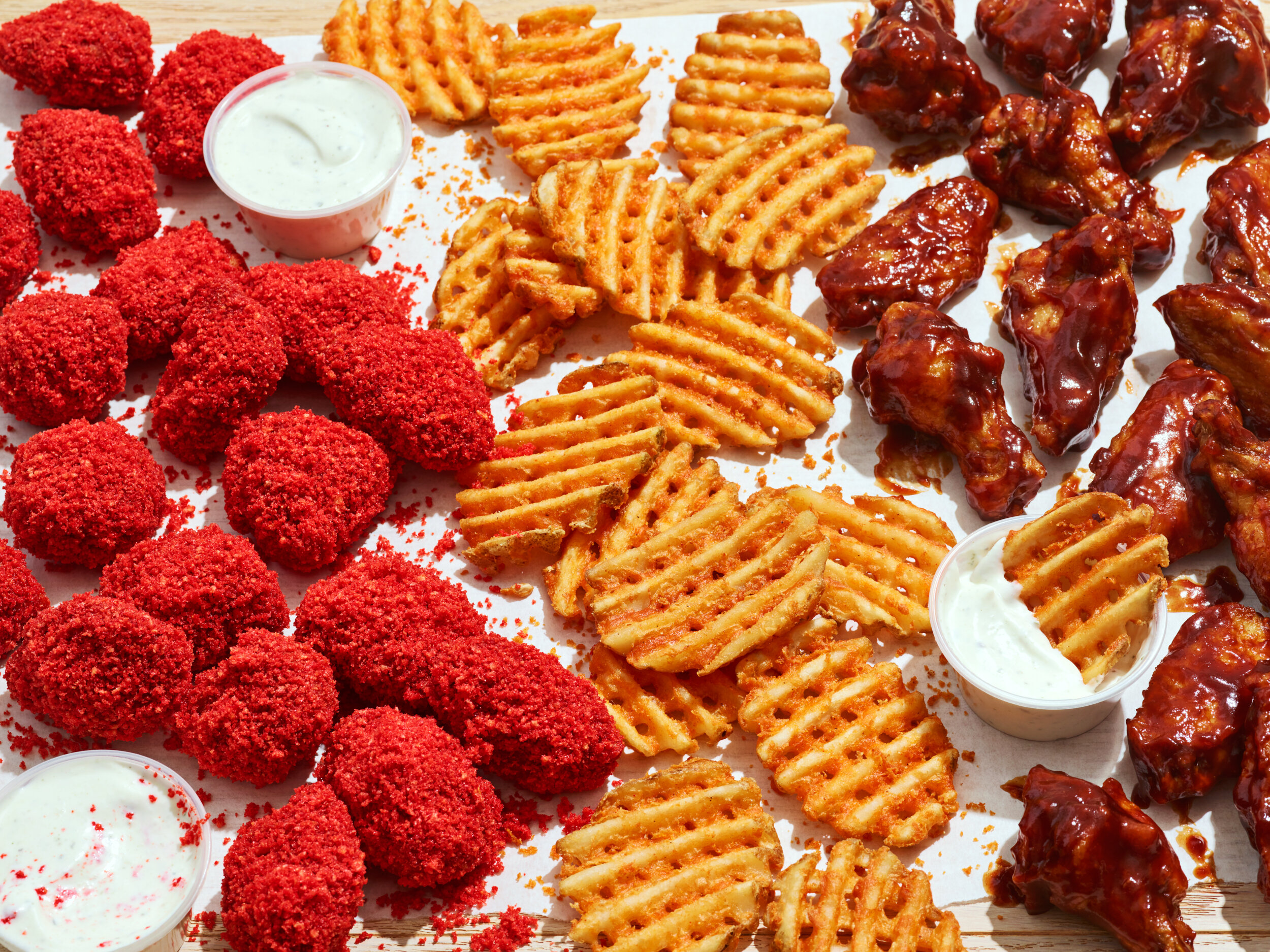 6-Cheetos®-Flamin'-Hot-Boneless-Wings-Honey-BBQ-Bone-in-Wings-Waffle-Fries_0144_R1_V2.jpg