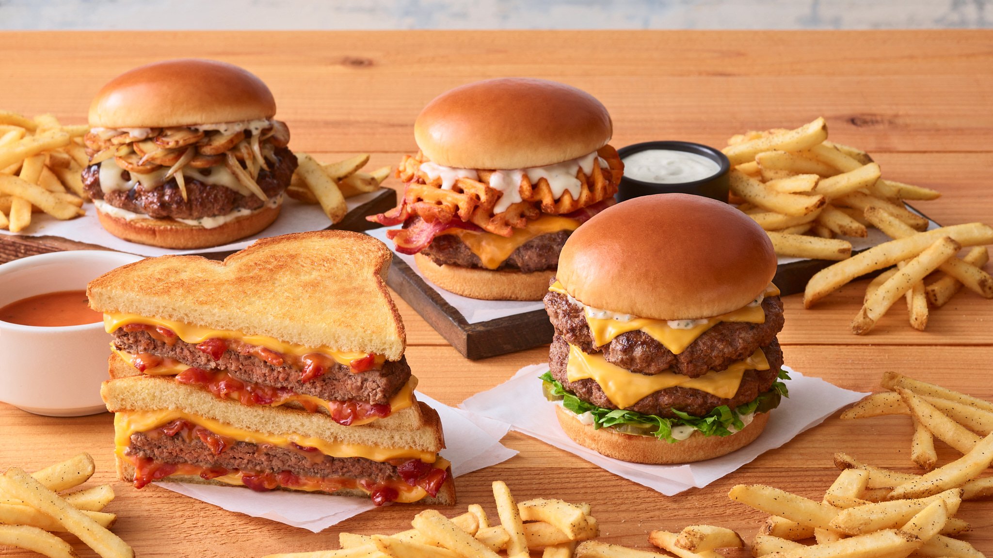 1A-Breadth-Shot-Bourbon-Street-Mushroom-Swiss-Burger-Loaded-Waffle-Fries-Burger-Grilled-Cheese-Cheeseburger-Neighborhood-Burger-2-and-Fries-0033-R2-V1.jpg