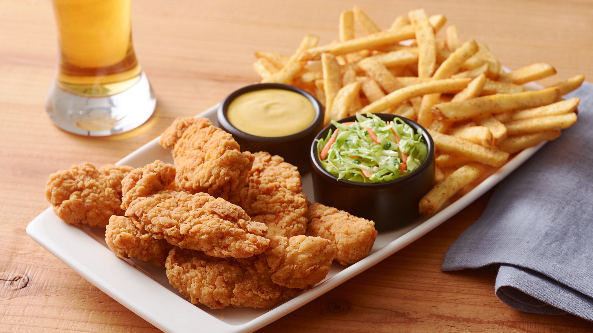 035-4-Chicken-Tenders-Platter-Coleslaw-Fries-Brewtus-0523-110322-R1-V2.jpg