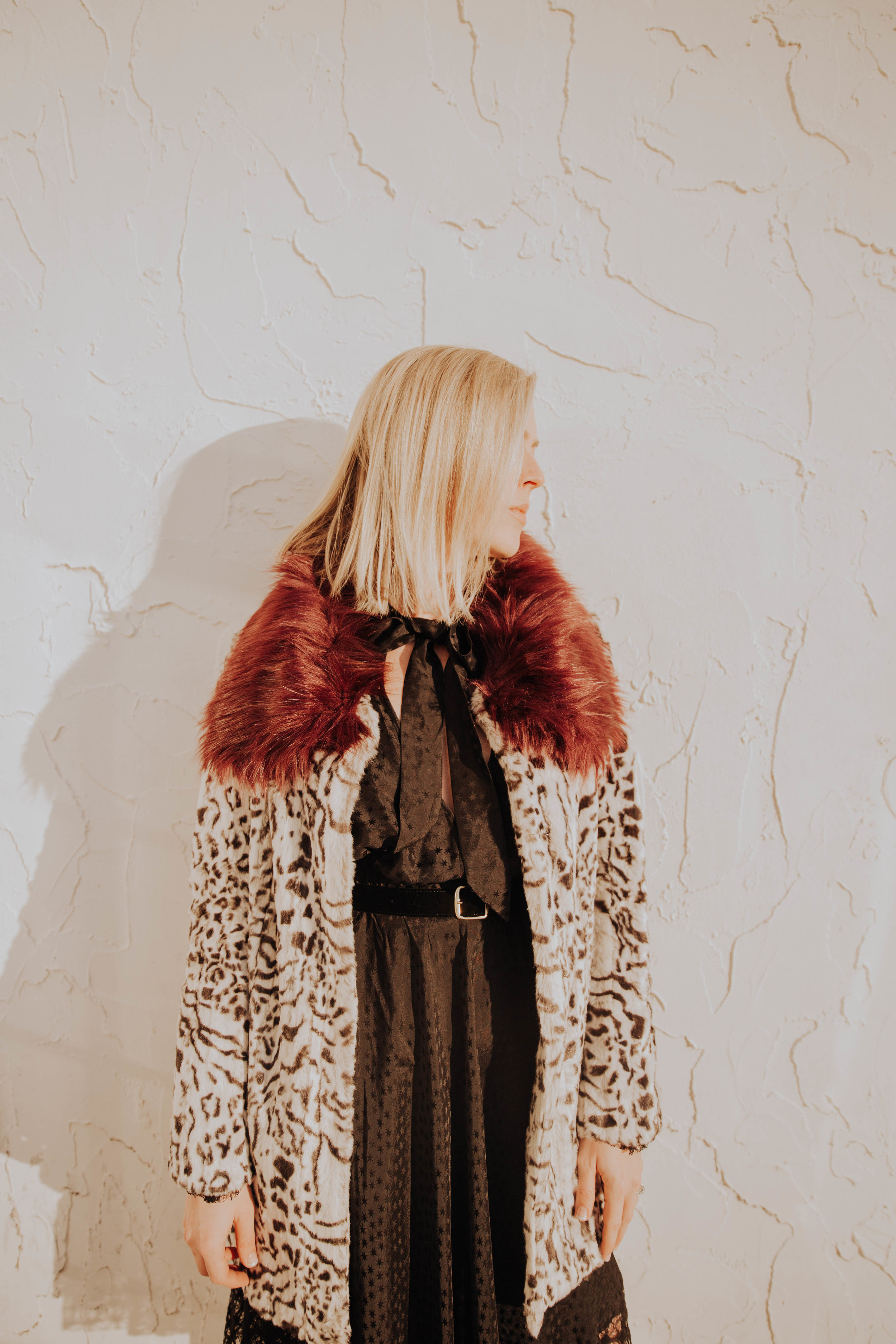 The Borrowed Babes Fashion Blogger Stephanie Mack Kearney wearing Unreal Fur Coat and Philosophy di Lorenzo Serafini from Rent the Runway