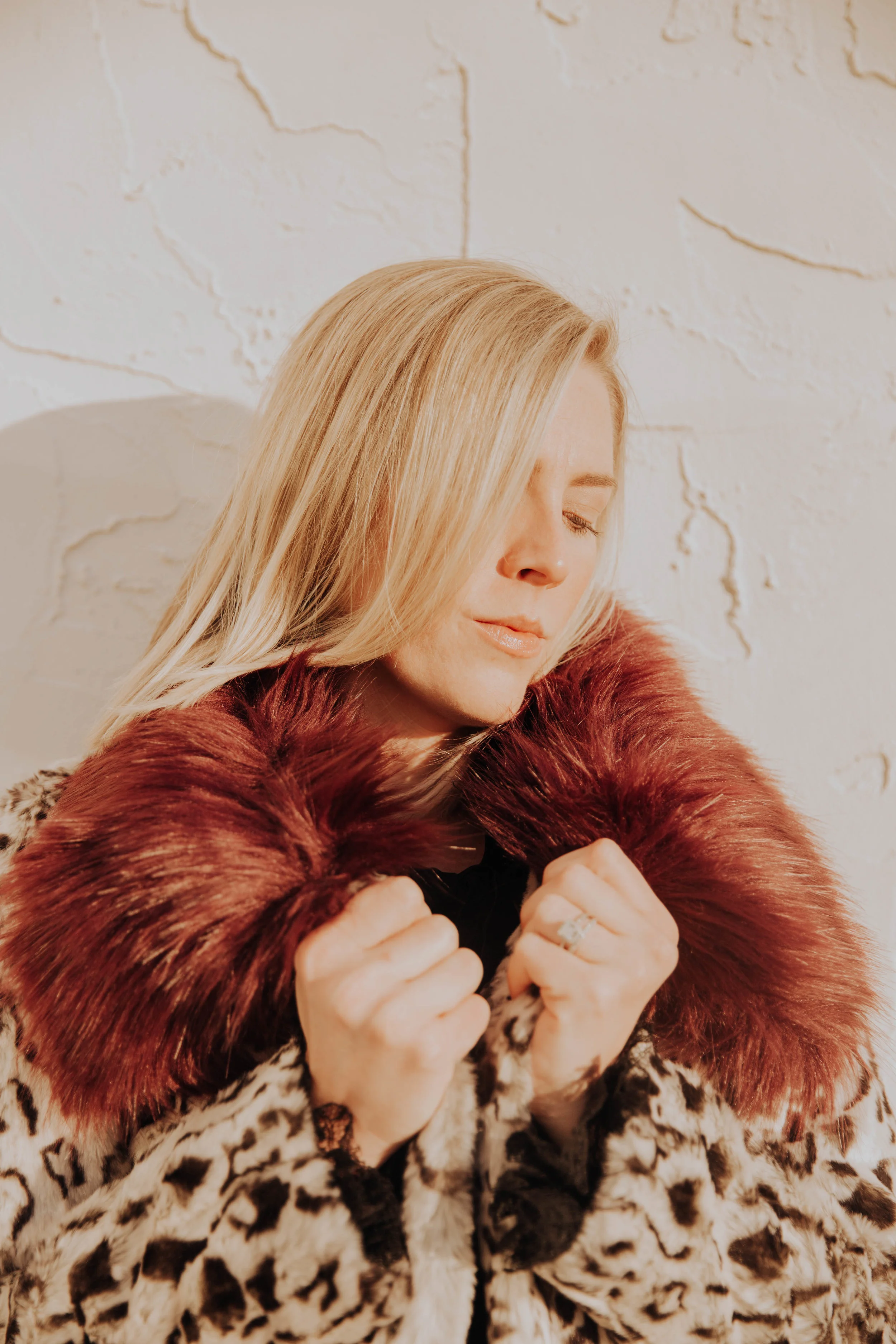 The Borrowed Babes Fashion Blogger Stephanie Mack Kearney wearing Unreal Fur Coat and Philosophy di Lorenzo Serafini from Rent the Runway 