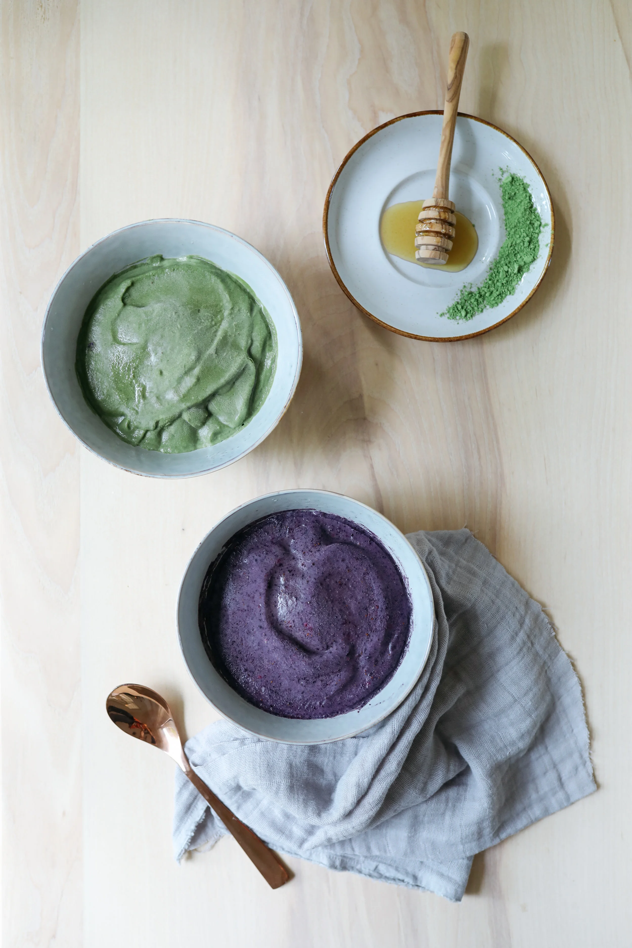 Freshly made acai purple smoothie bowl and matcha supergreen smoothie bowl Try them today!