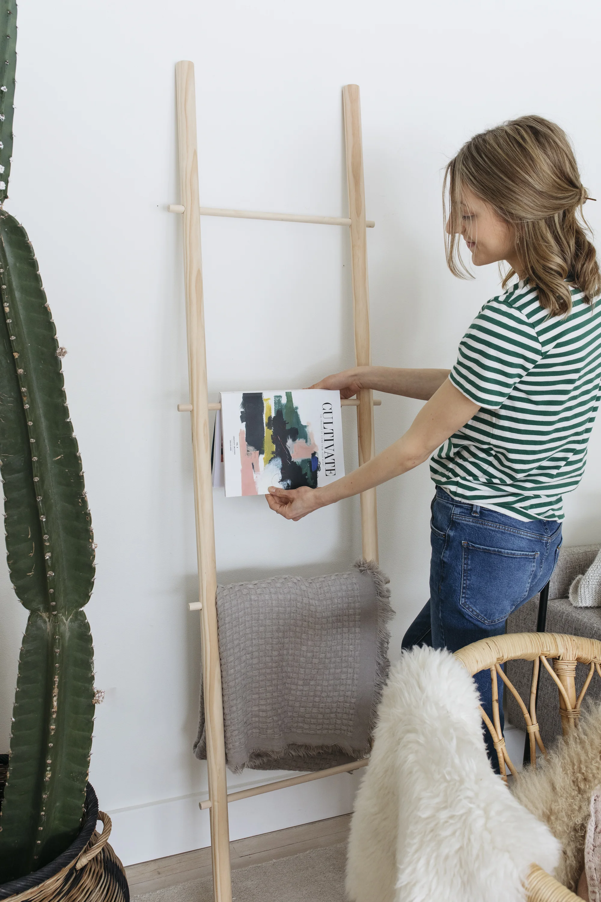 I hung a magazine on my diy towel ladder to give the some some super 3d wall art