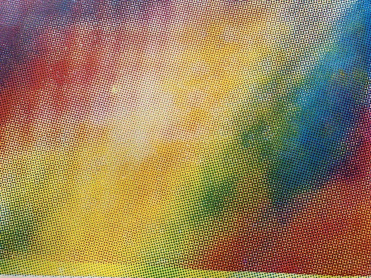 close up photo of print after yellow, magenta and cyan only