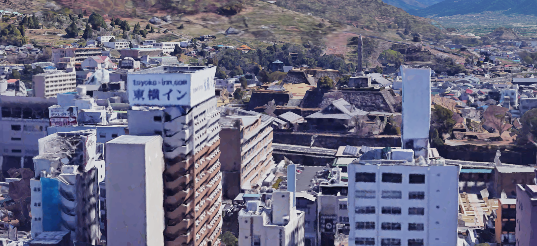 The hotel with the ruins of Kofu Castle behind it