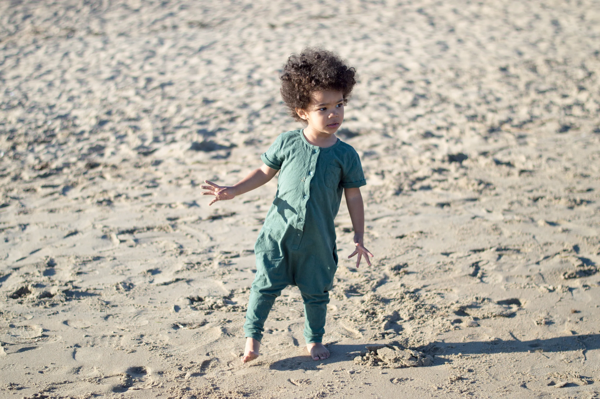 romper: gray label