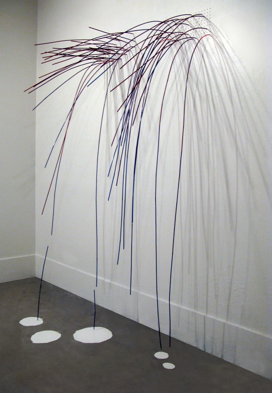 Drip Drilled holes in sheetrock wall, drinking straws, house paint, hotmelt glue; installation at Caldera Arts Center, Sisters, OR 12’ x 5’x 3’