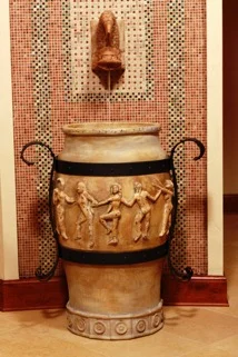 Fountain, mosaicked back splash, and vessel by Ann Wydeven 