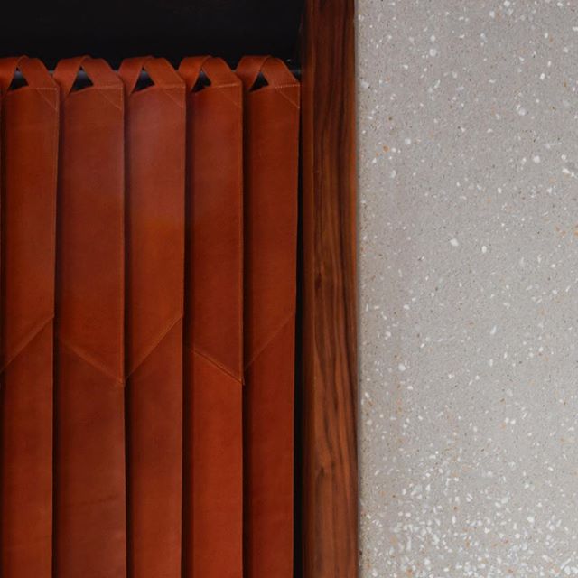 Leather door close-up, inspired by meat fridge plastic curtains.  Strips of leather held from the top by straps in cross directions to create a tilt in direction. @skirtbeirut  #mariagroup