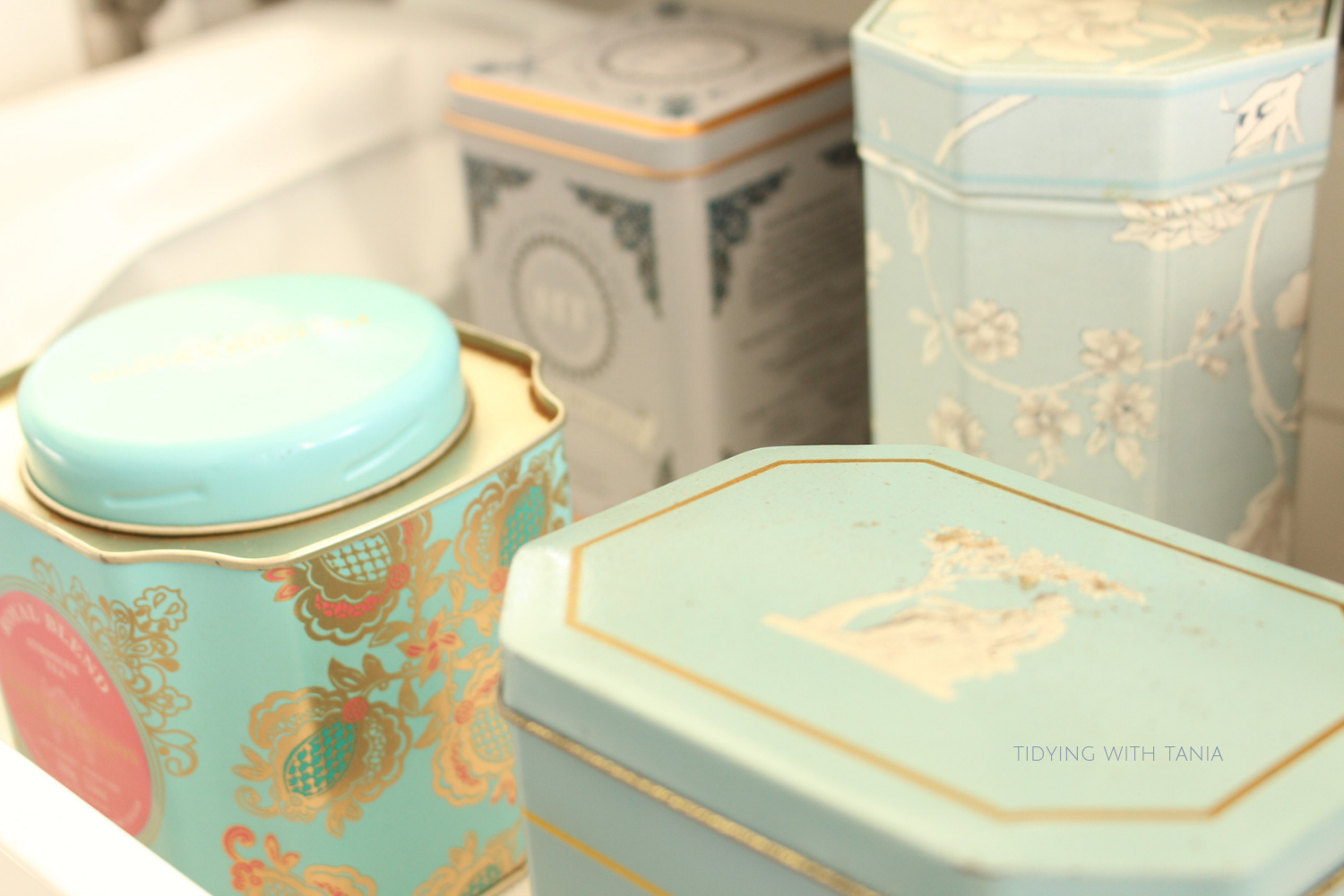 tea tins in drawer.png