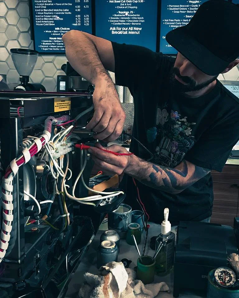 Matt Fixing Espresso Machine.jpg