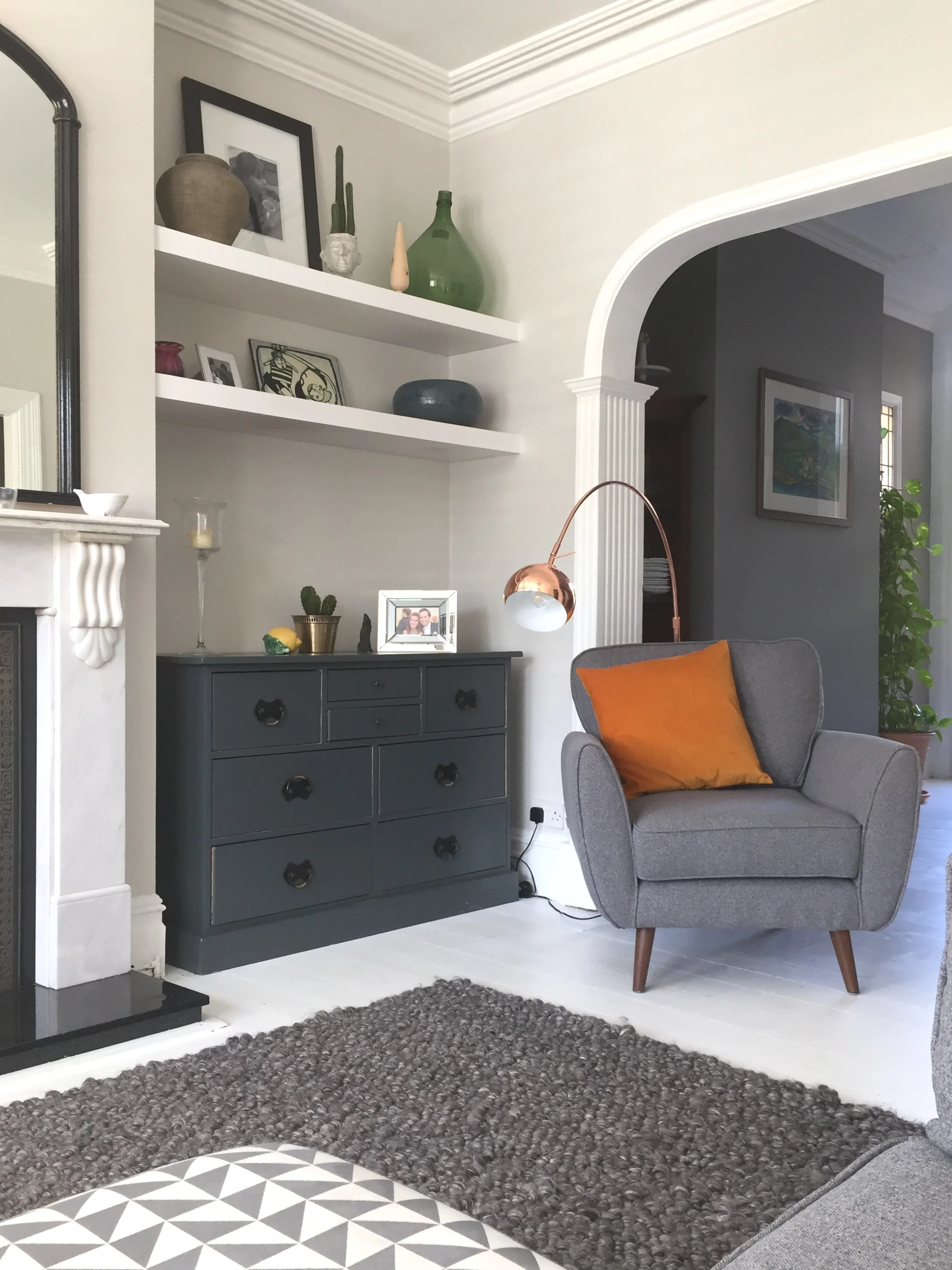 We had some shelves built into the alcoves. We also stripped and repainted the dresser that was left behind buy the previous owners in Farrow and Ball's Downpipe.