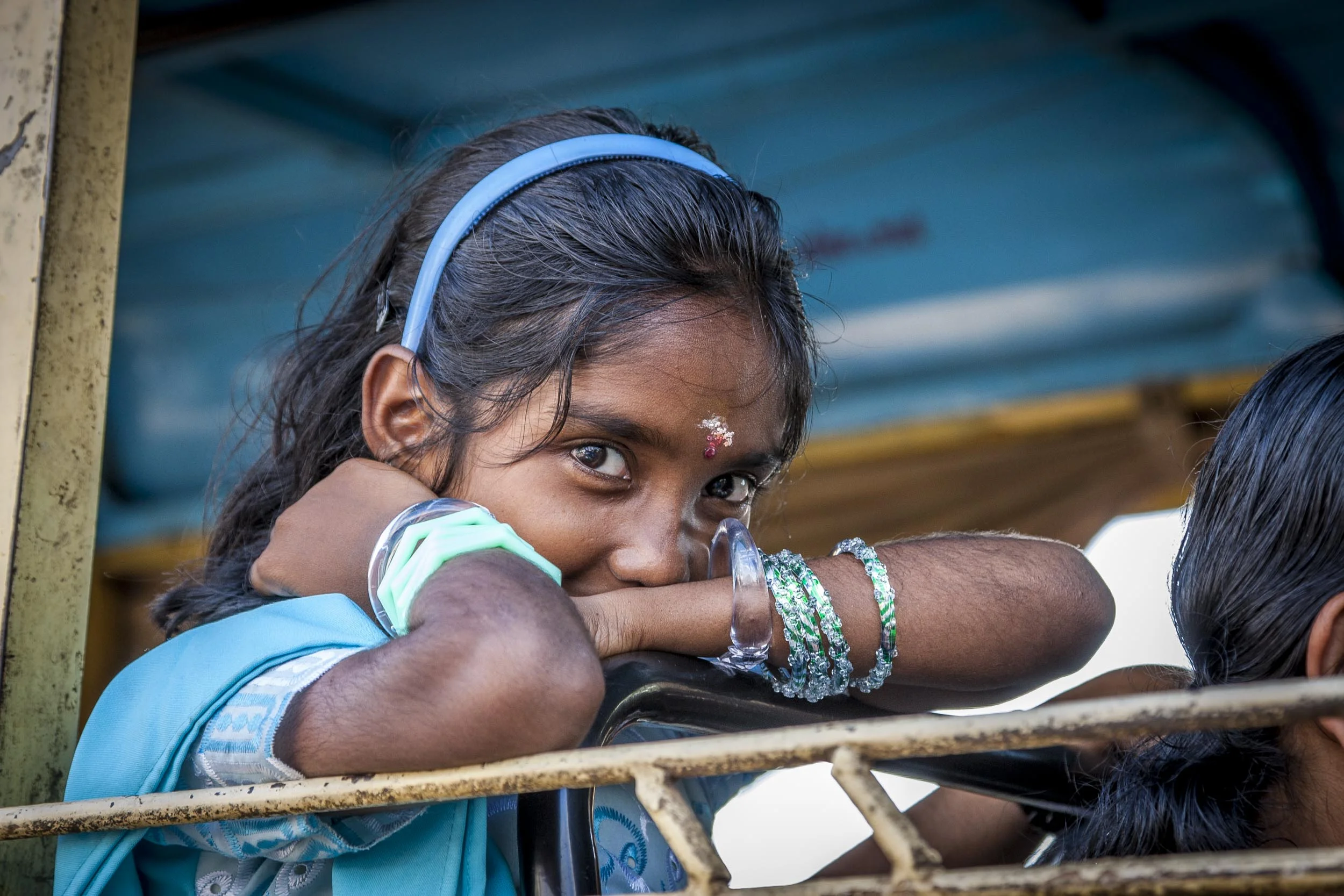 GIRL ON BUS IN OACHIRA, KERALA, SOUTH INDIA.