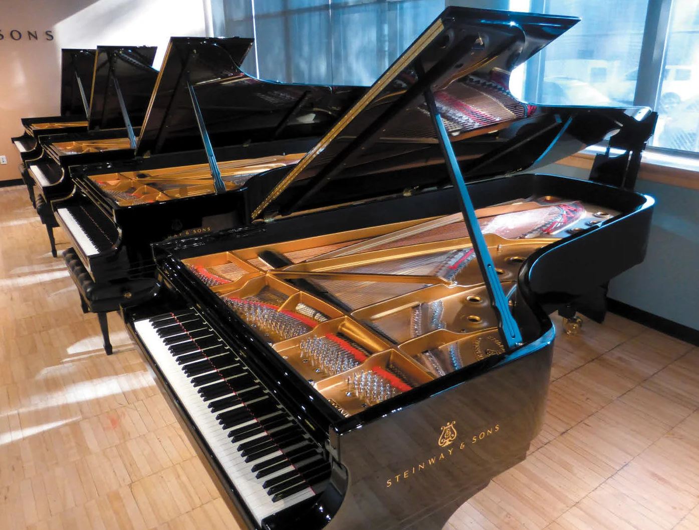 New polished piano finishes at the Steinway & Sons factory selection room in Long Island City, N.Y. 