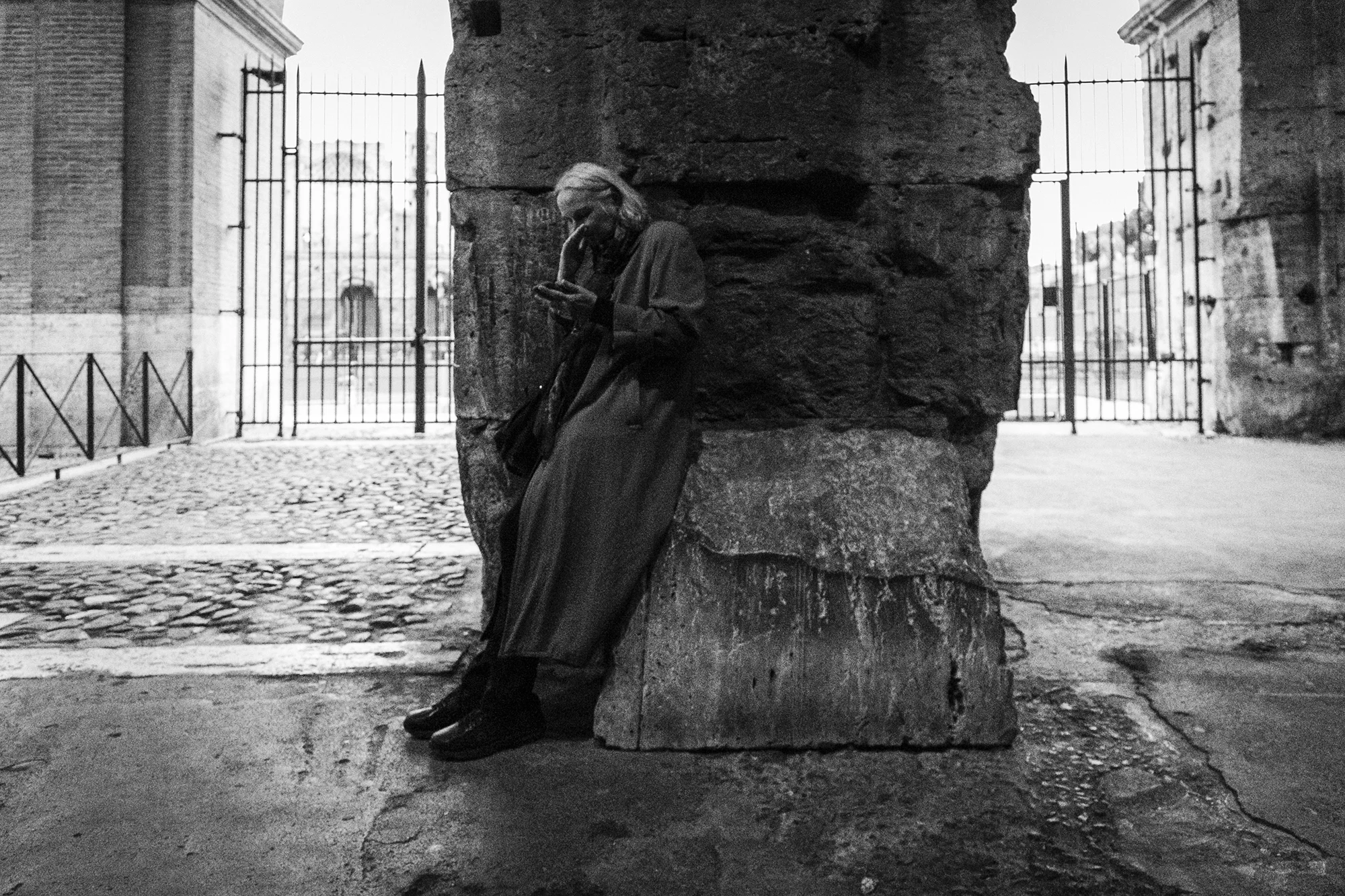 A crying woman in The Colosseum