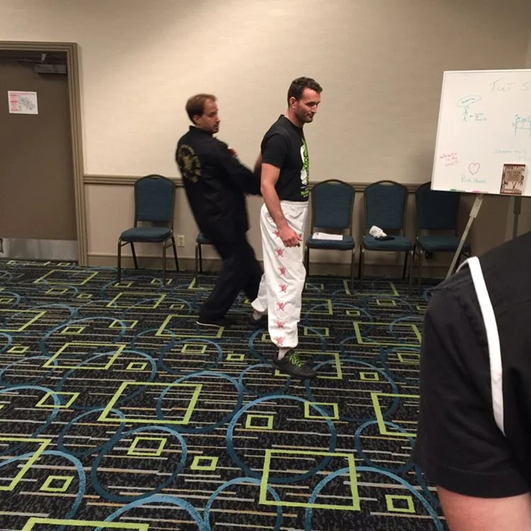 Shifu Lee Yokota (LakeParkKungFu.com) and myself demonstrating a throw counter.