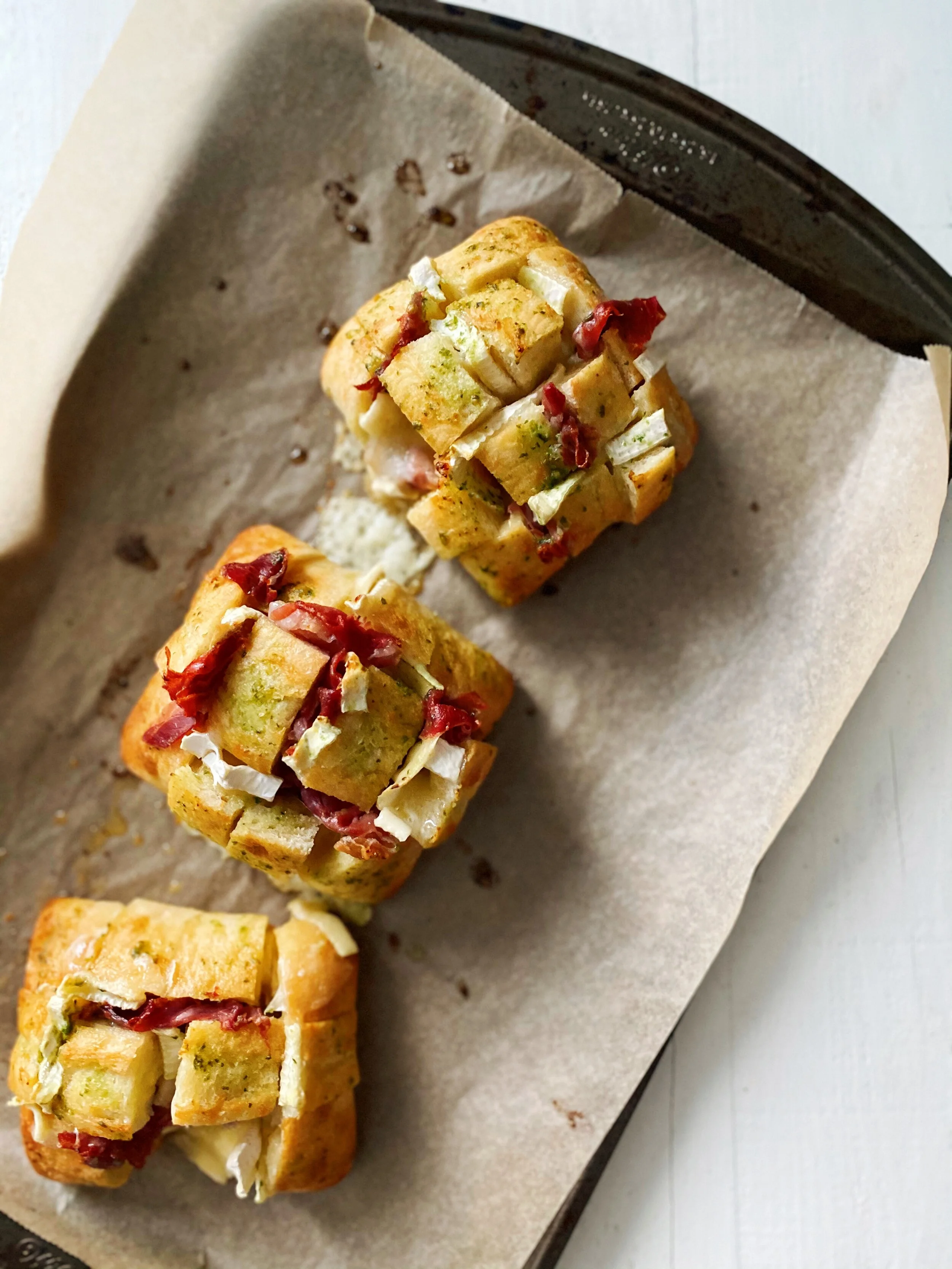Individual Brie Pull-Apart Rolls with Prosciutto + Pesto