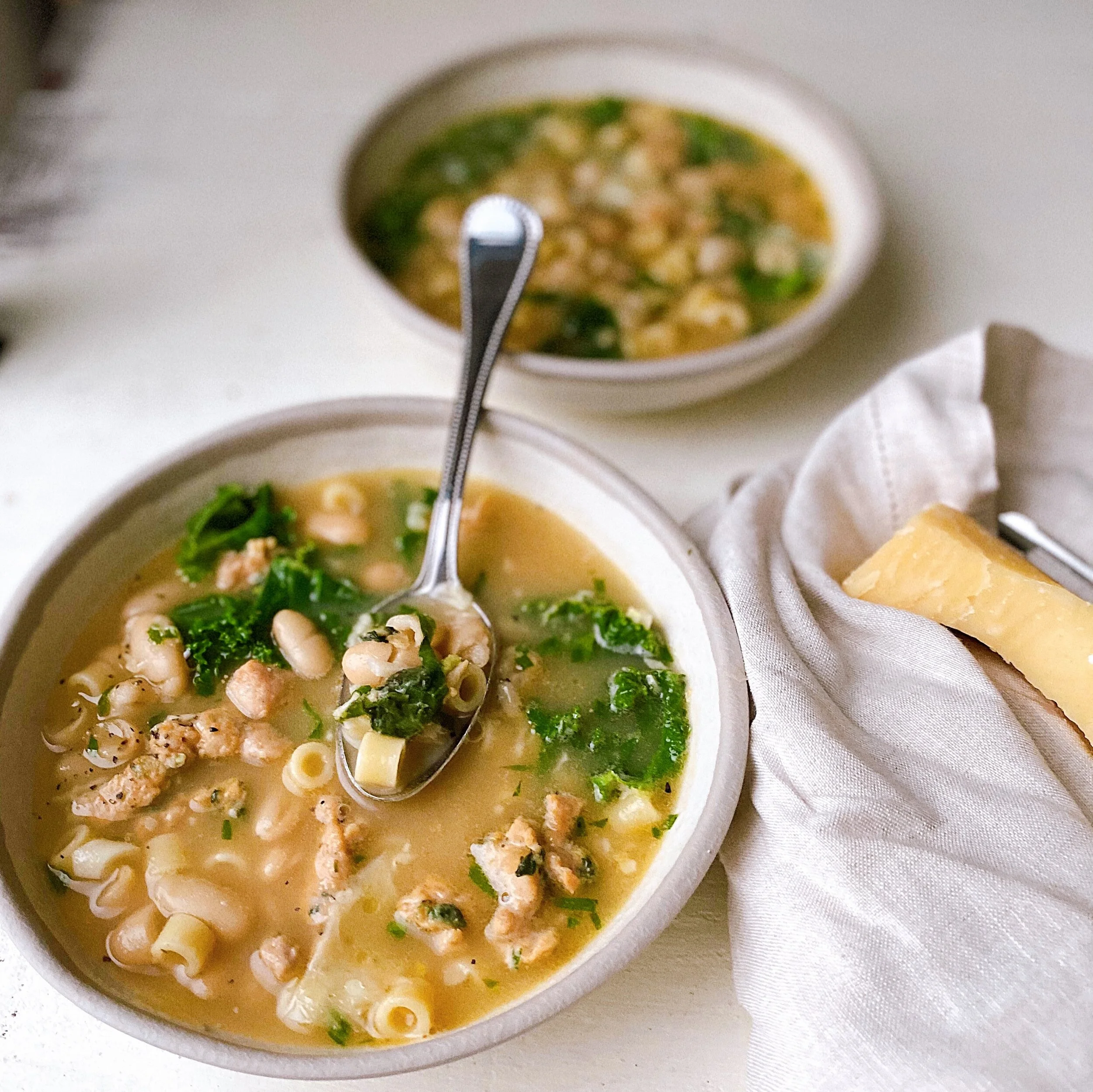 Tuscan White Bean Noodle Soup with Chicken Sausage and Kale