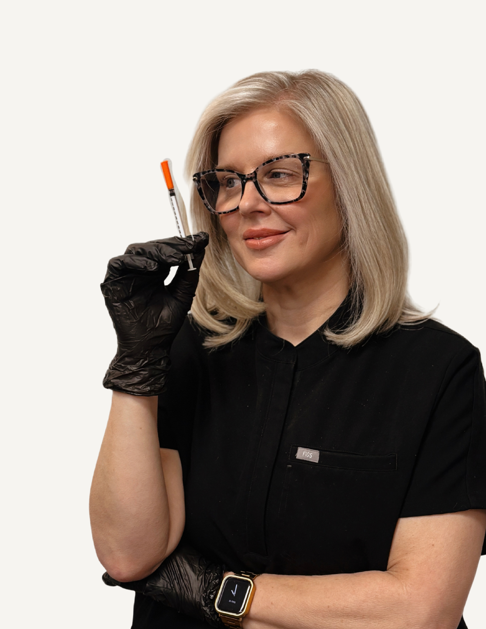 A woman with blonde hair and glasses, wearing a black top, smiling at the camera.