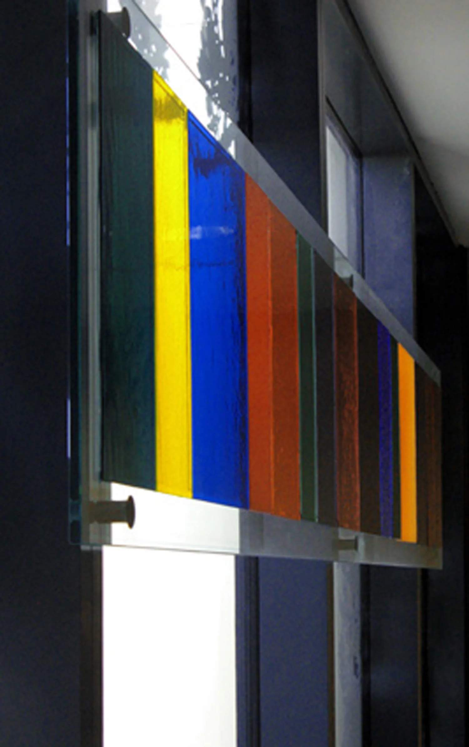 Laminated panel fastened to interior vertical mullions