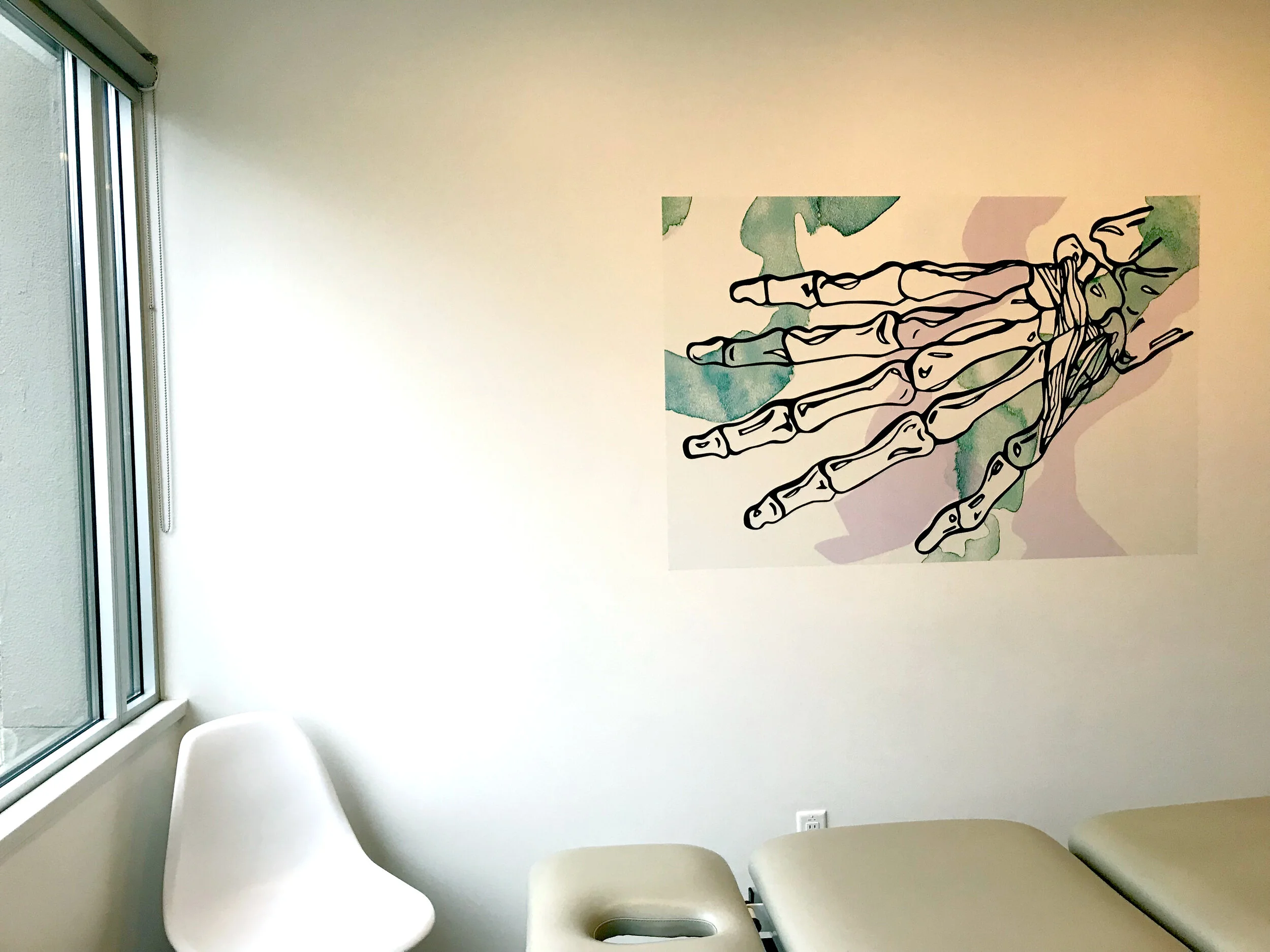 Vanessa Grondin_North Shore Myodetox Physio and Massage Clinic Design_2020_hand in clinic room.jpg