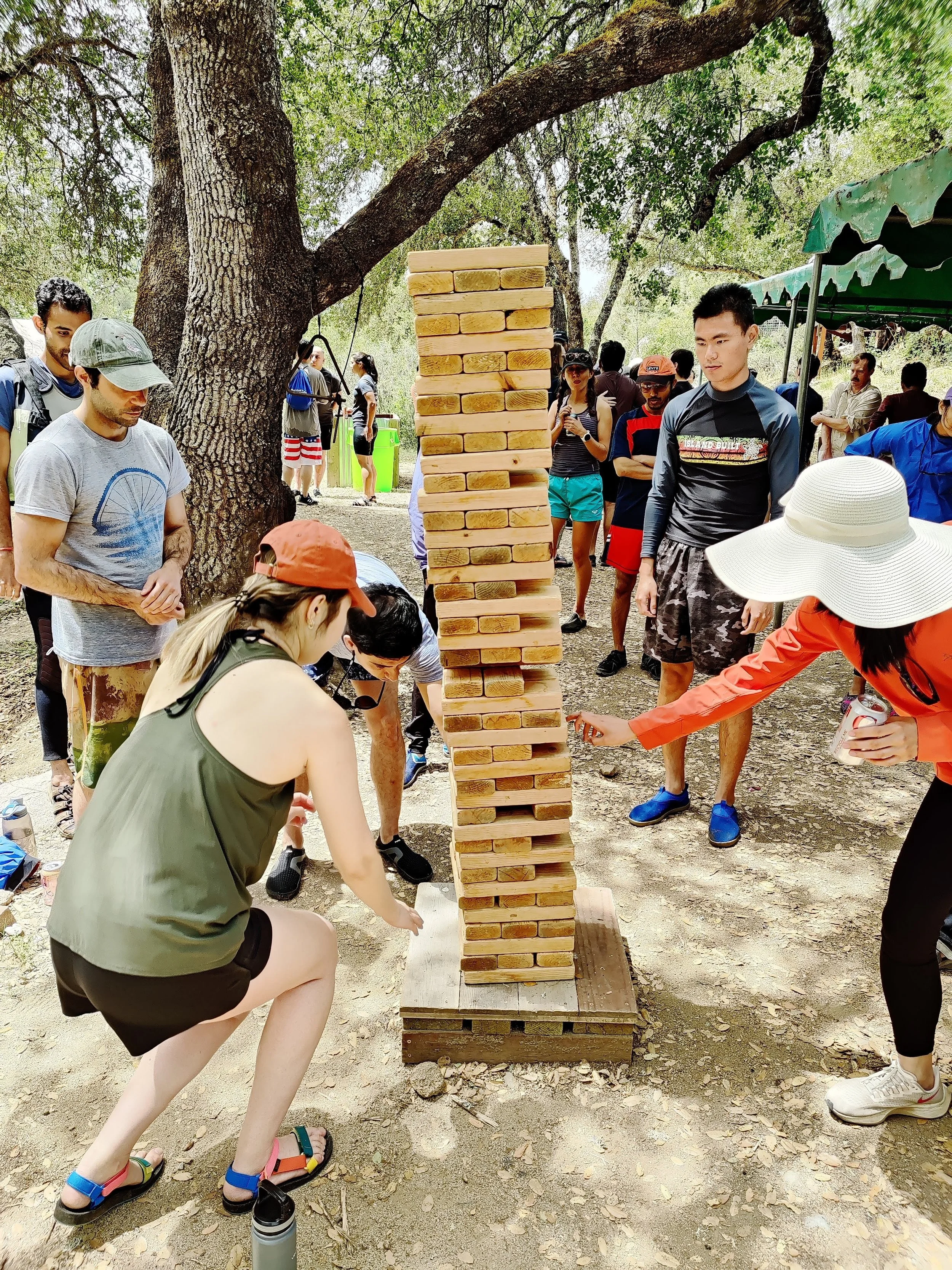 Playing giant Jenga at Tributarys south fork american river camp.jpg