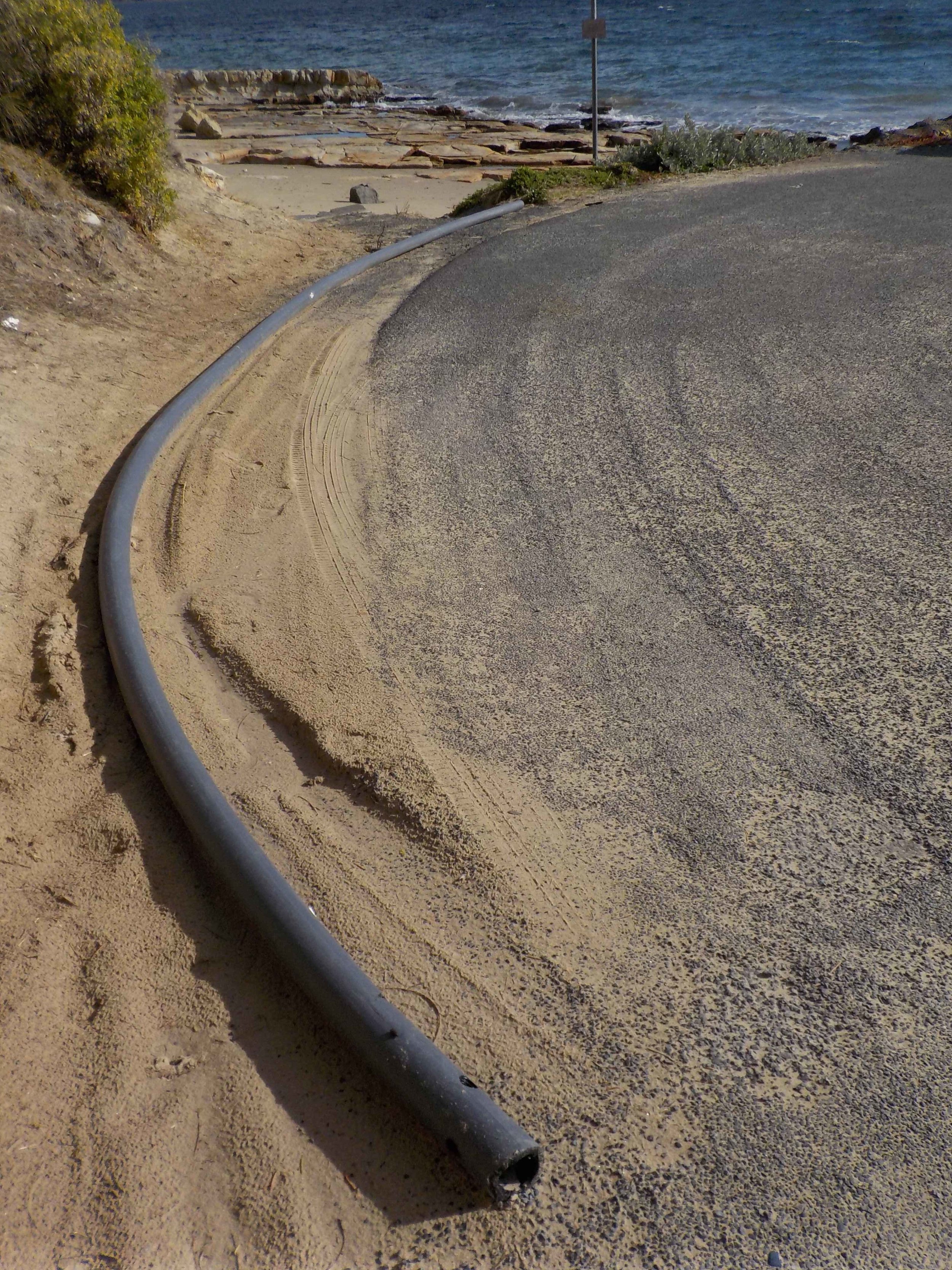 This 10m length of plastic pipe was recovered by the author from near the South Arm boat ramp in the middle of 2016. It is probably a feeder pipe from a fish farm in North-west Bay. It was later collected by the Clarence Council and presumably taken to landfill. The pipe is the equivalent in weight to 1240 standard shopping bags. If left where it was found it probably would have ended up in the open ocean and eventually broken up into fragments small enough to be ingested by birds, fish and other animals. Photo by Peter McGlone