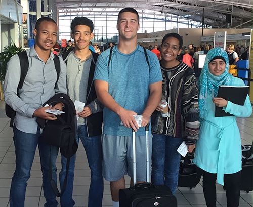 Cole Reat (middle) and Ellie Bennett (right of Reat) heading to the 21st Century School Integration conference.