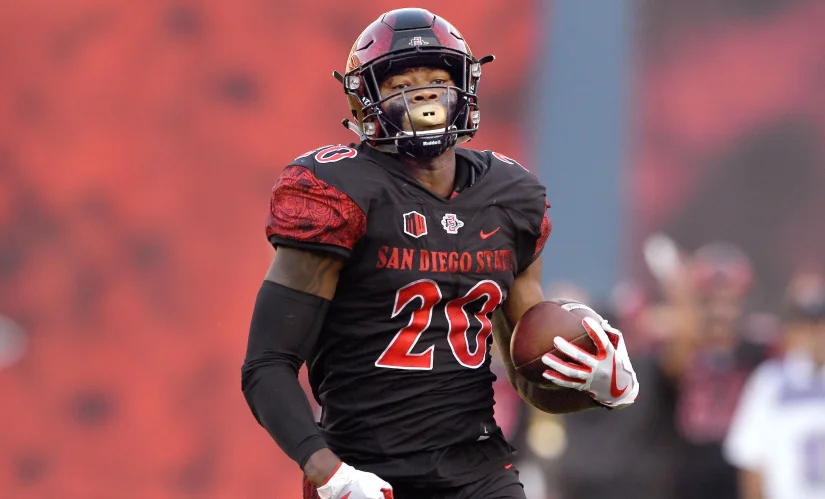 Norwalk’s Rashaad Penny rushes for 4 touchdowns in final college game