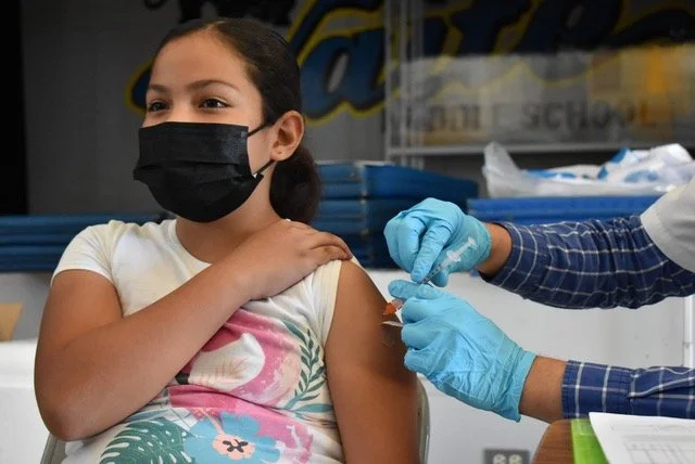 Parents, students get vaccinated at Waite Middle School clinic