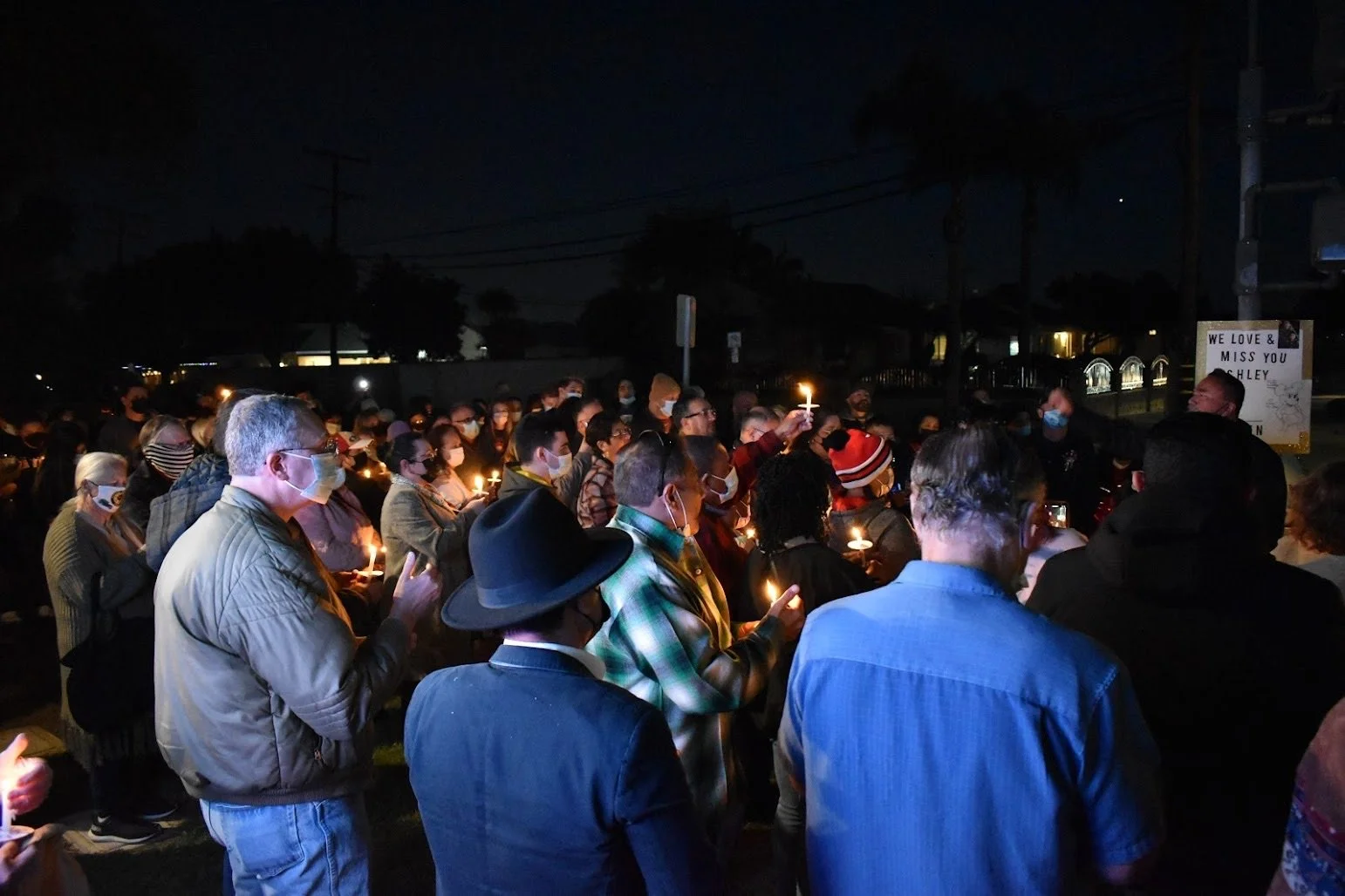 At candlelight vigil, community demands action from Gascón