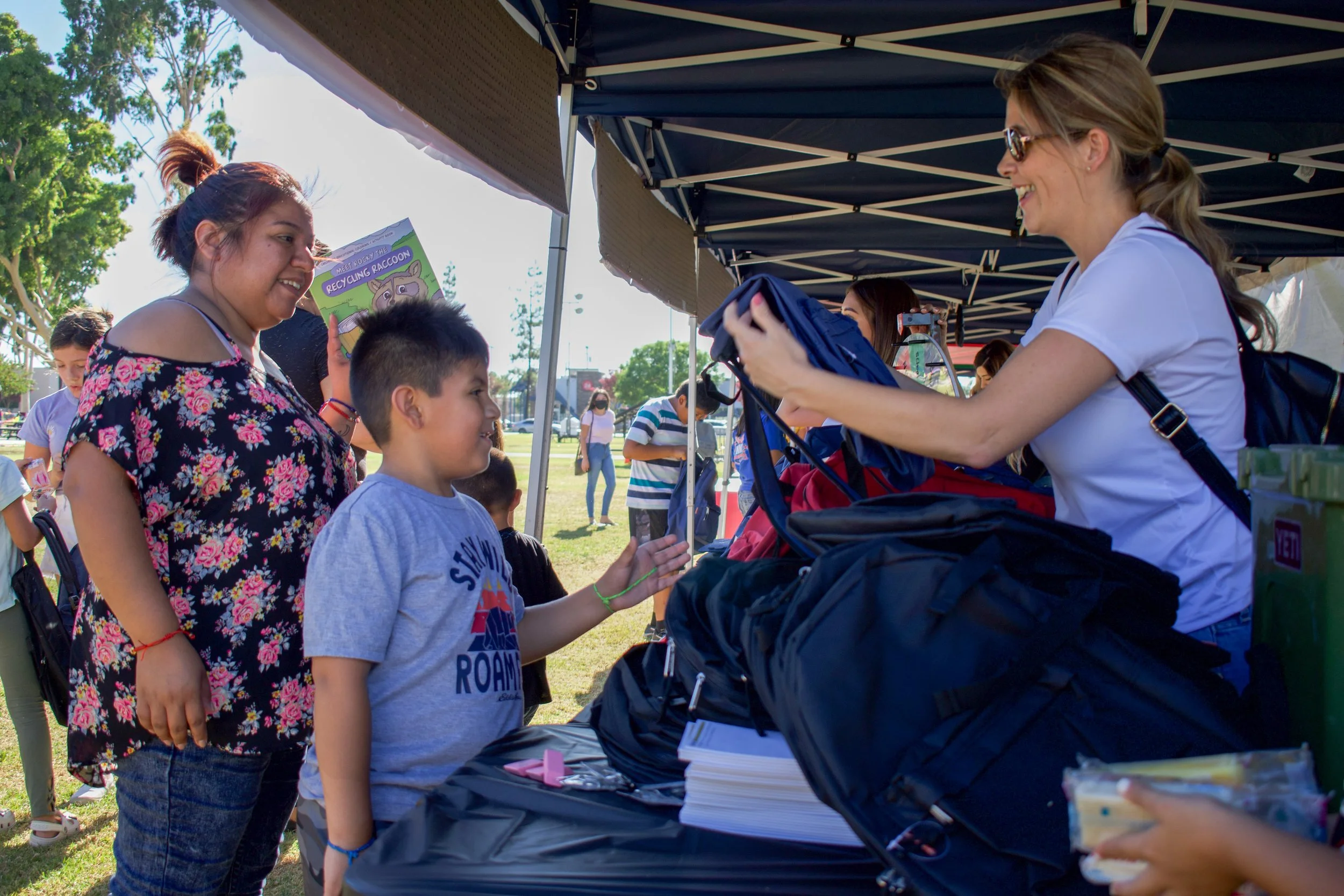 Norwalk gives away backpacks at concert