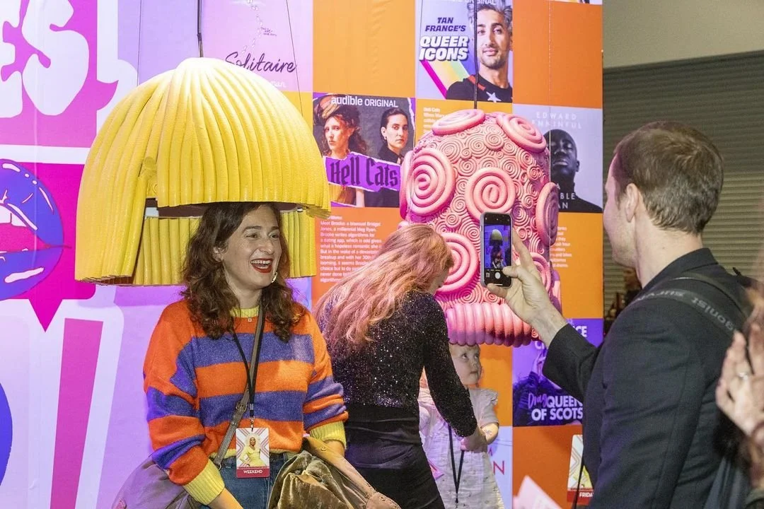 Listening wigs at the Audible stand