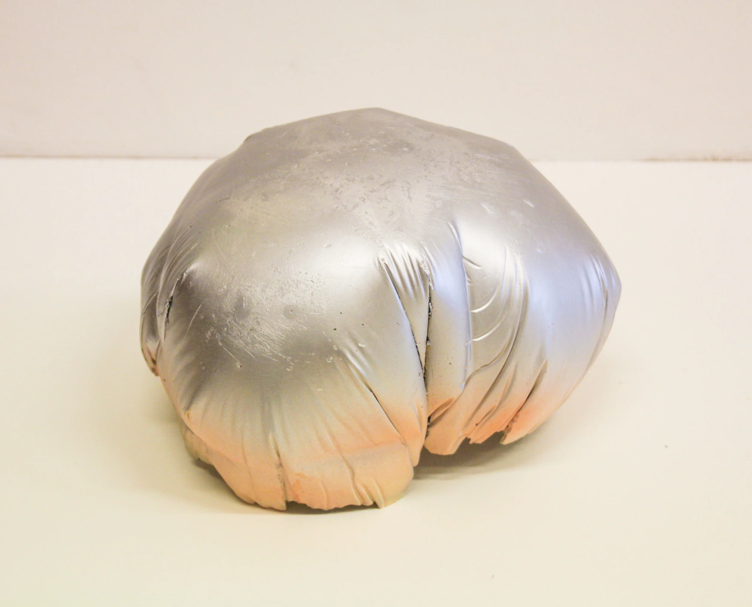 Undercover , 2016 Concrete, silver paint, 30 x 30 x 20 cm Photo: Kristin Velle-George