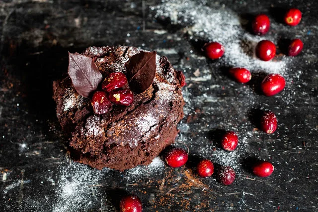 Chocolate, aubergine, cranberry and orange cake