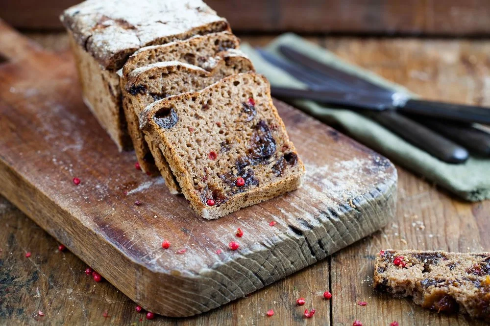 Rye loaf with prunes and pink pepper