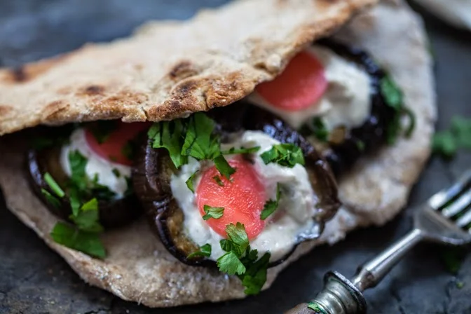 Aubergine with tahini, yogurt and pickled radish