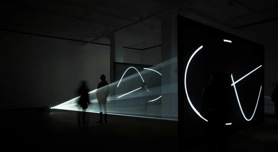 “Circulation Figures” and “Face to Face” are two light installations from the British-American artist Anthony McCall. Photo: Jason Wyche, Courtesy of the Artist and Sean Kelly, New York