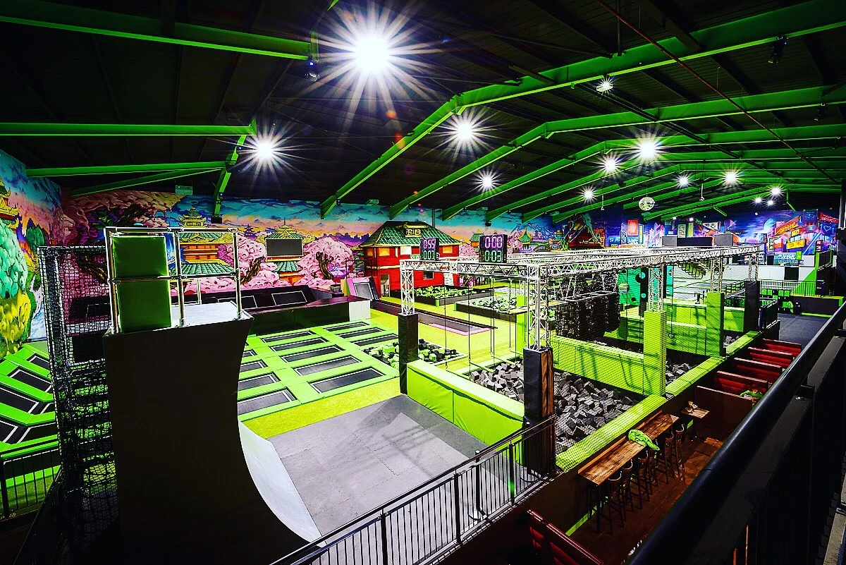Children enjoying indoor trampoline park