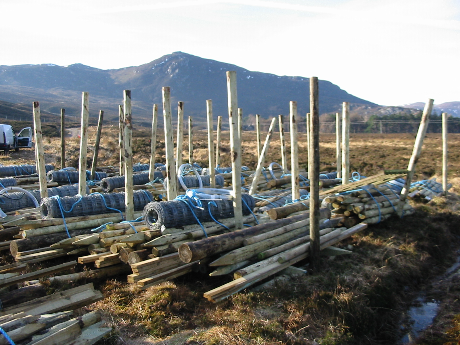 Bundles of deer fence materials waiting for helicopter uplift